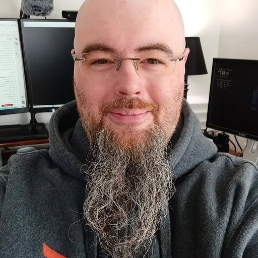 Picture of Wesley Dean wearing a gray hoodie